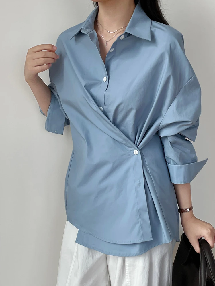 [EAM] Women Blue Irregular Button Pleated Big Size Blouse New Lapel Long Sleeve Shirt Fashion Tide Spring Autumn 2024 1DH7463