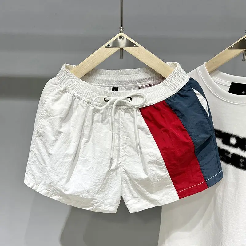 

Casual beach pants men's summer men's vertical strip color matching running sports three-point shorts tide