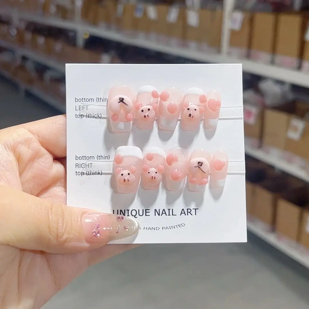 

Оптовая продажа, милый скульптурный дизайн свиньи зодиака, съемный высококачественный многоразовый элегантный белый пресс на ногтях. No D118