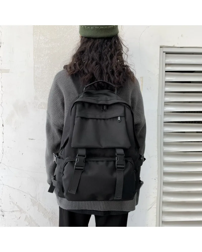 Black tactical style backpack multi pocket design adjustable straps water resistant fabric for men women work travel daily use