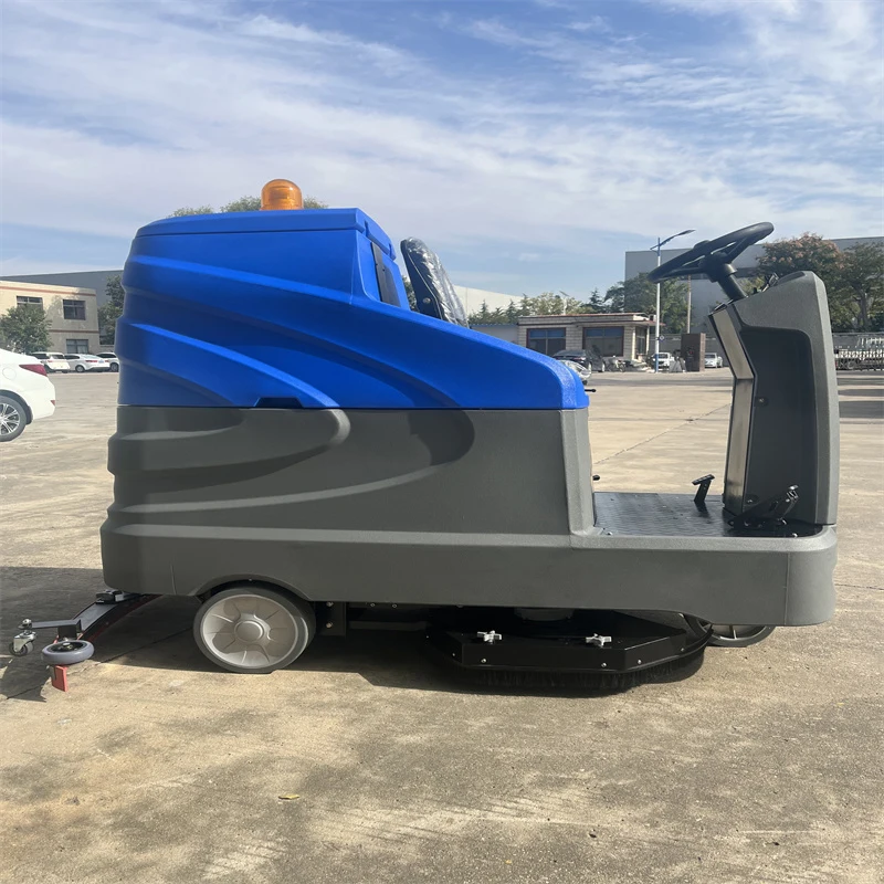 Macchina industriale per asciugatrice per pavimenti Ride-On per la pulizia della superficie del calcestruzzo della macchina per la pulizia del pavimento di grandi magazzini