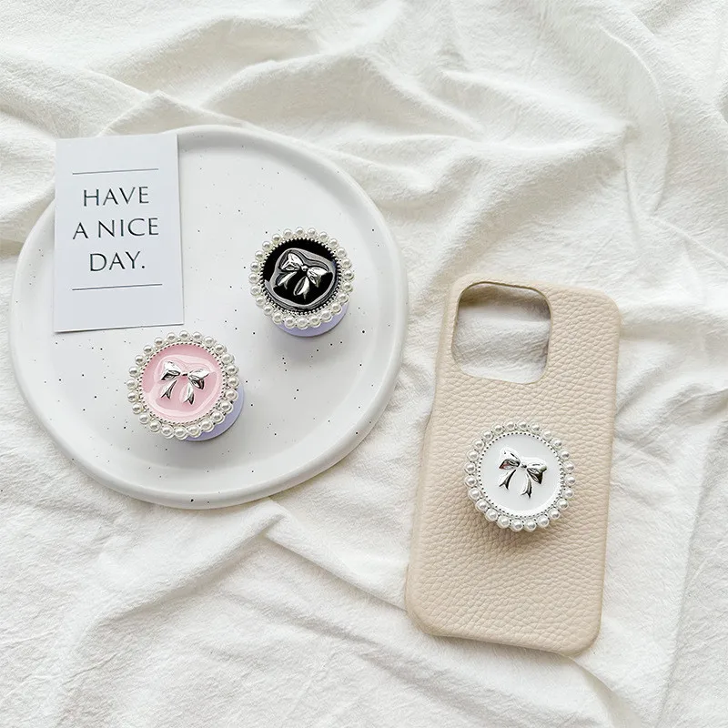 

Luxury Metal Pearl Bow Mobile Phone Holder Stand Fold Finger Grip Bracket Accessories Socket For iPhone 15 16 Xiaomi