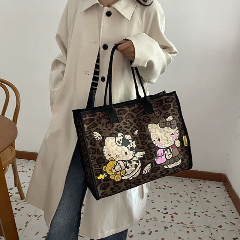 Sanrio Hello Kitty tas kanvas wanita, kapasitas besar Vintage pola macan tutul tas belanja lucu kartun tas Tote tas tangan bahu