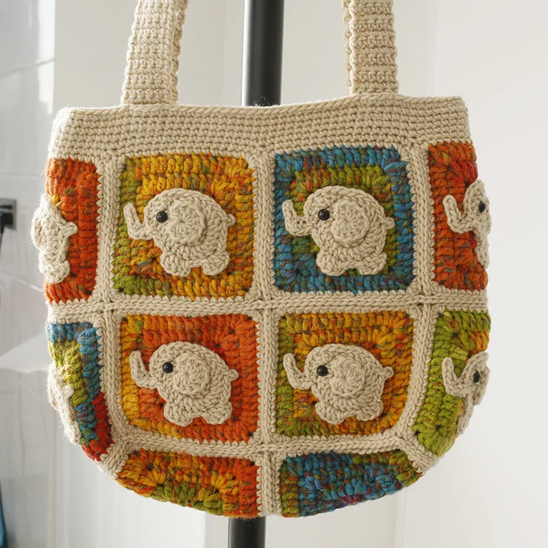 Hand-woven baby elephant shoulder bag, sweet cartoon hand hook women's bag, hand hook fresh zipper shoulder satchel.
