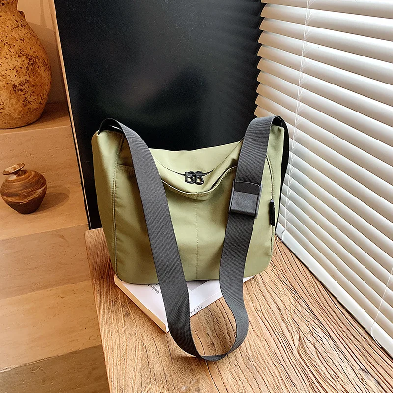 Afbeelding 6: Universiteitsklasse pendeltas voor dames 2025 Nieuwe casual eenvoudige crossbody canvas tas Student boekentas Lichtgewicht stoffen tas