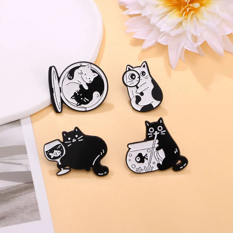 Cartoon magnifying glass, cat alloy brooch, creative and funny, drinking water, black and white cat accessories, badge