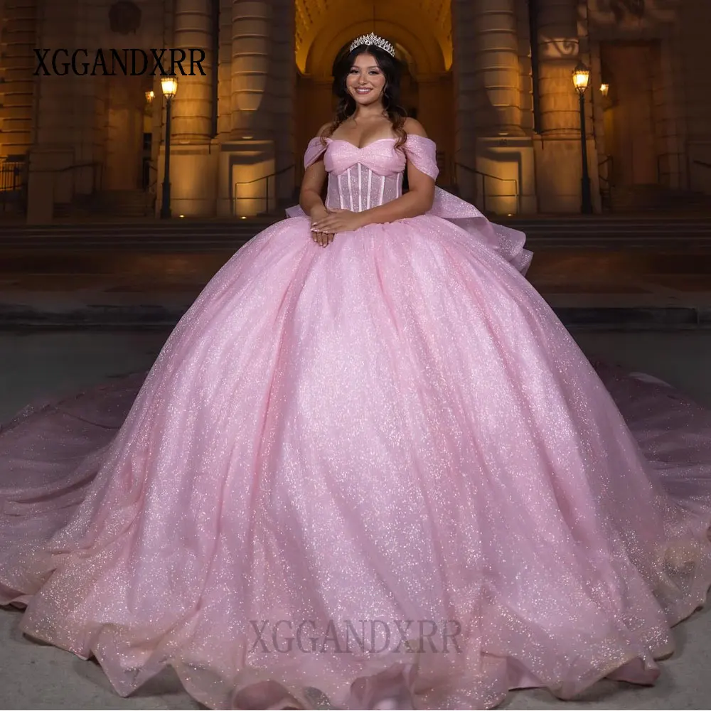 

Luxury Pink Long Train Ball Gown Quinceanera Dresses 2026 Big Bow Pleat Floral Appliques Ruffles Corset Vestidos De 15 Años Gala