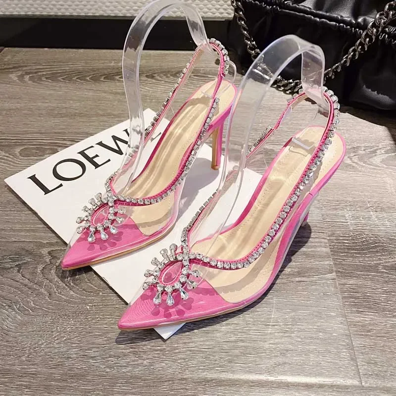 

2024 Summer New High Heel Diamond Chain Fashion PVC Transparent Pointed Shallow Mouth Fine Heel Banquet Muller Women's Sandals