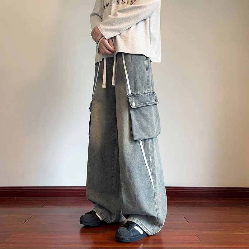 

Джинсы-карго, мужские свободные брюки для уличных танцев, молодежный тренд, брюки с эластичной резинкой на талии, украшения на бретелях, большие карманы, рабочая одежда в стиле хип-хоп