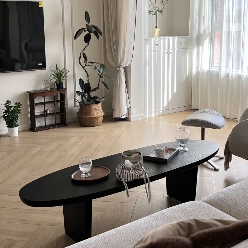 Black solid wood coffee table oval Nordic simple living room home small apartment designer bed and breakfast log table