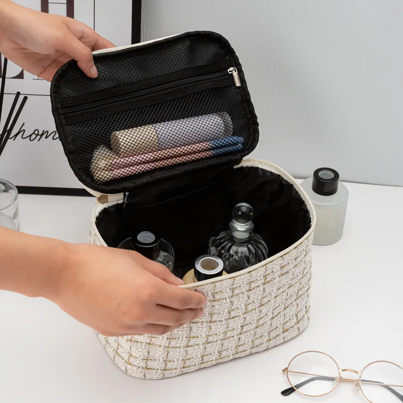 Internet celebrity handheld makeup bag, large capacity Instagram style portable and high-value travel grooming storage bag