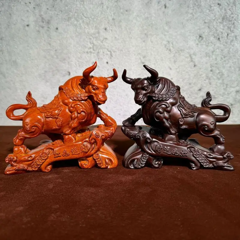 Ebony wood carving of the zodiac animal Ox, a fortune-bringing ornament. The Ox symbolizes prosperity and soaring fortune. Suita