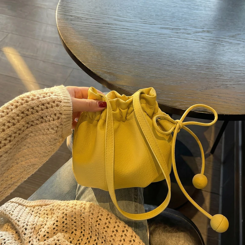 

New Cloud Ladies Fashion Casual Shoulder Bag with Butterfly Knot Drawstring Adjustable Strap Bucket Bag Stylish Crossbody Bag