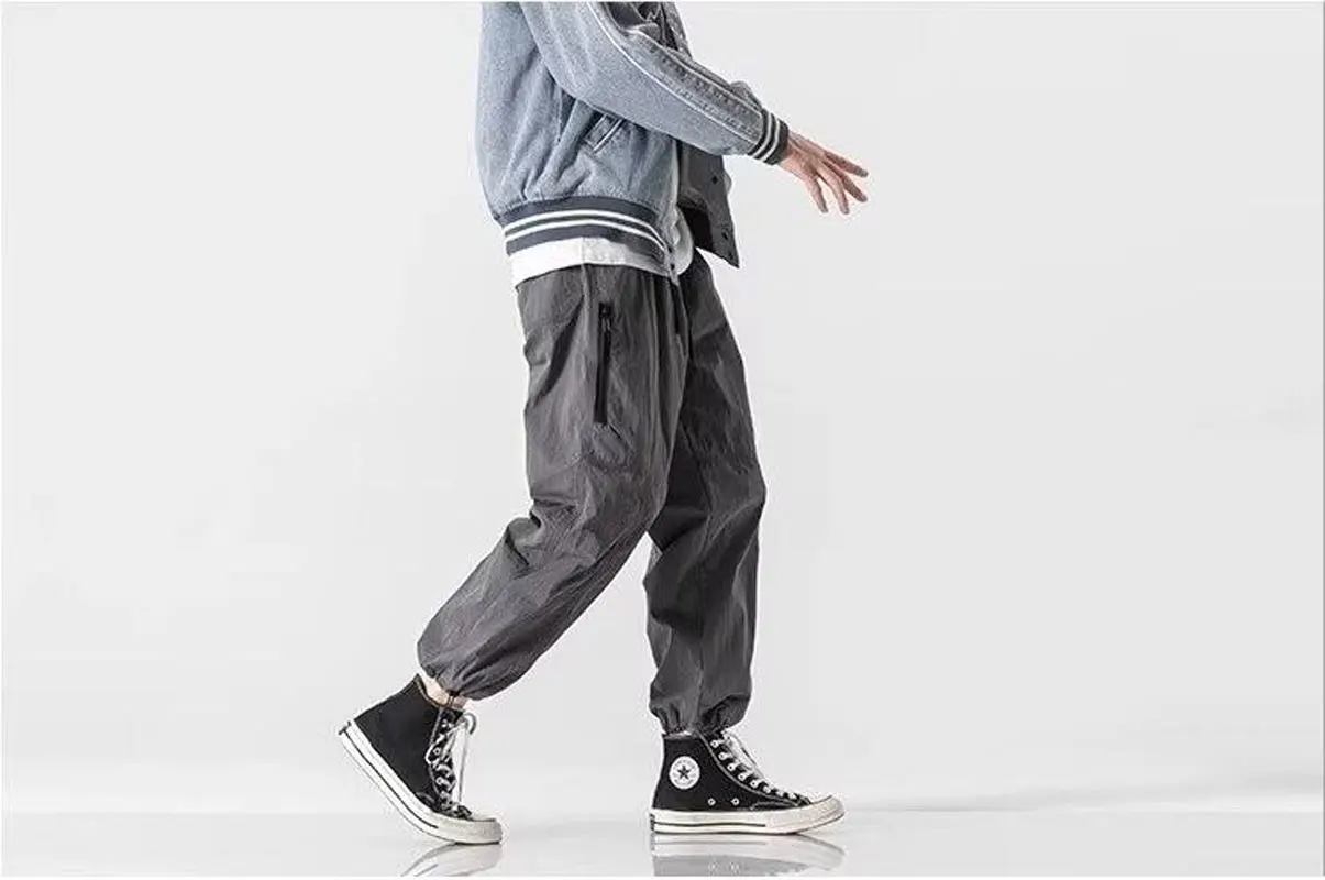 Everyday trend Outdoor sports Zipper pocket loose conical cargo drawstring leg casual pants for men