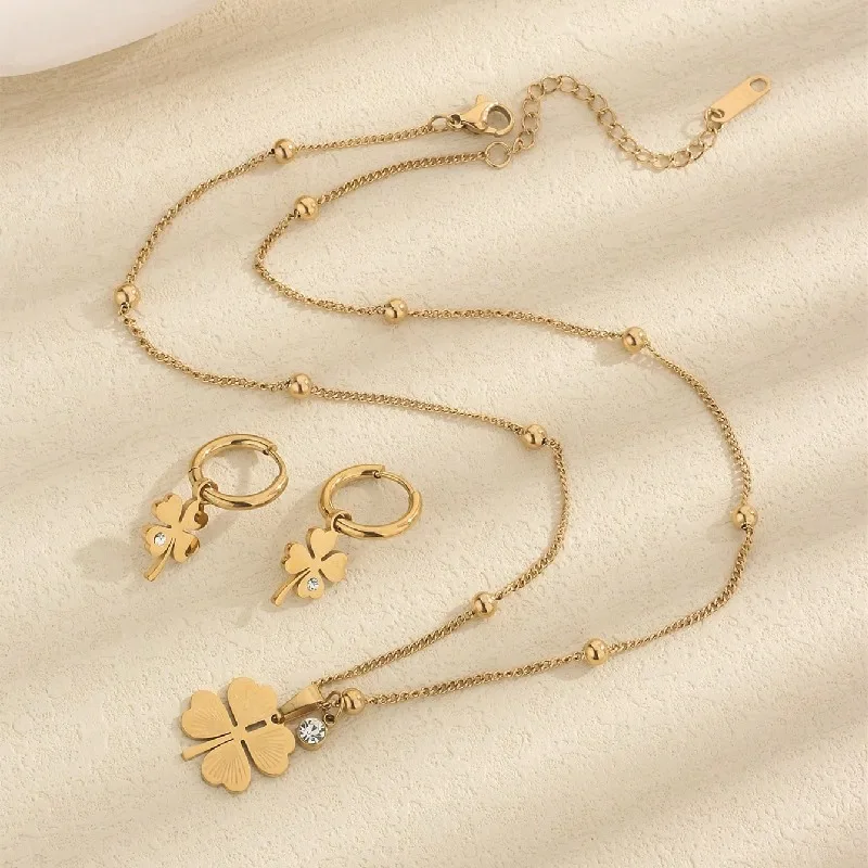 The light luxury minority inlays the diamond four leaf flower necklace design feeling minority female necklace earring set