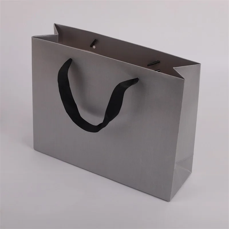 Custom..pieces.Hot Selling Luxury Wax-Coated Kraft Paper Bags with Ribbon Custom Logo Clothing Shopping and Promotion