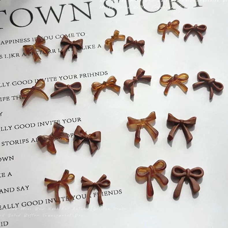 100 قطعة ثلاثية الأبعاد الاكريليك السحر الراتنج Bowknot الشتاء ميلارد البني الشريط القوس مسمار الفن زينة DIY بها بنفسك مانيكير اكسسوارات حجر الراين