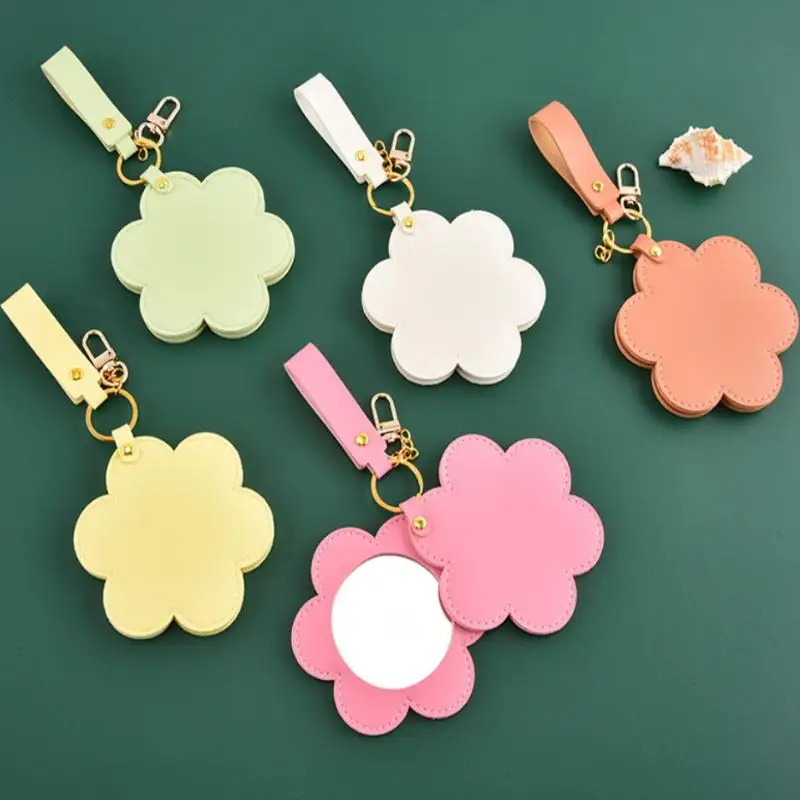 PU lederen bloemvorm make-upspiegel ronde ultradunne lichtgewicht cosmetische spiegels draagbare mini draaibare reiszakspiegel