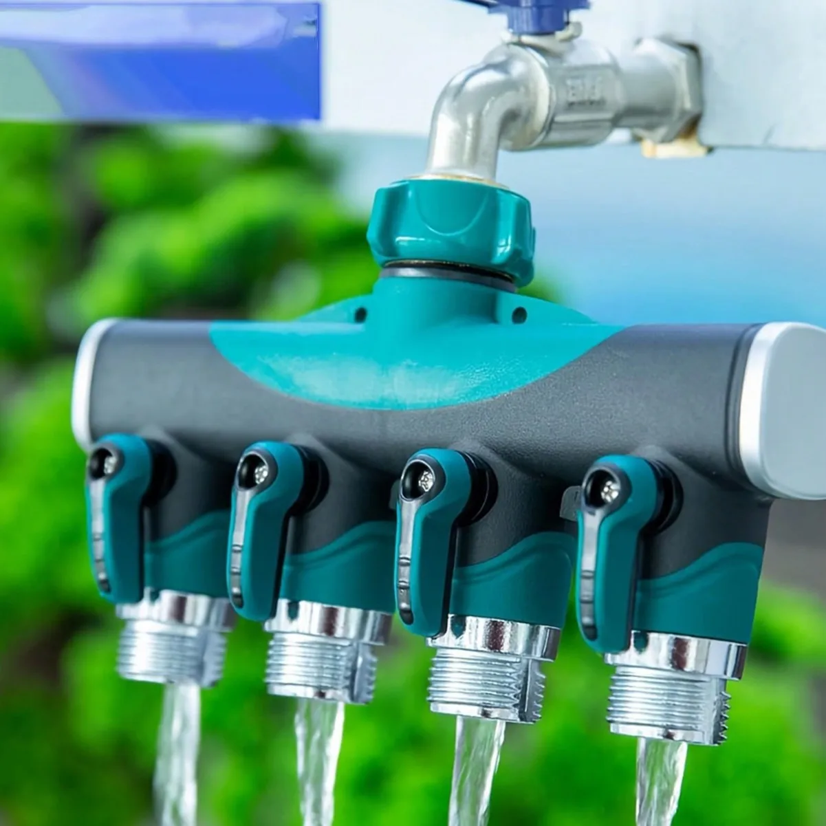 4-way garden splitter, hose connector with shut-off valves, for outdoor faucets to conserve water when watering plants.