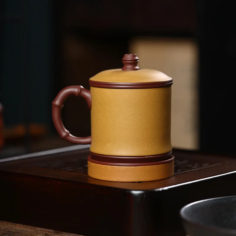 

Yixing Purple Sand Cup Handcarved Tea Separation Business Gold Section Set Cup Mud Powder Soaking Tea