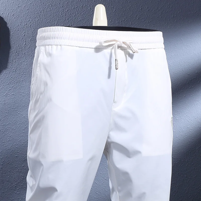 2025 Summer Thin Men's Quick Drying Pants White Breathable Elastic Slim Fit Leg Tight Casual Sports Pants