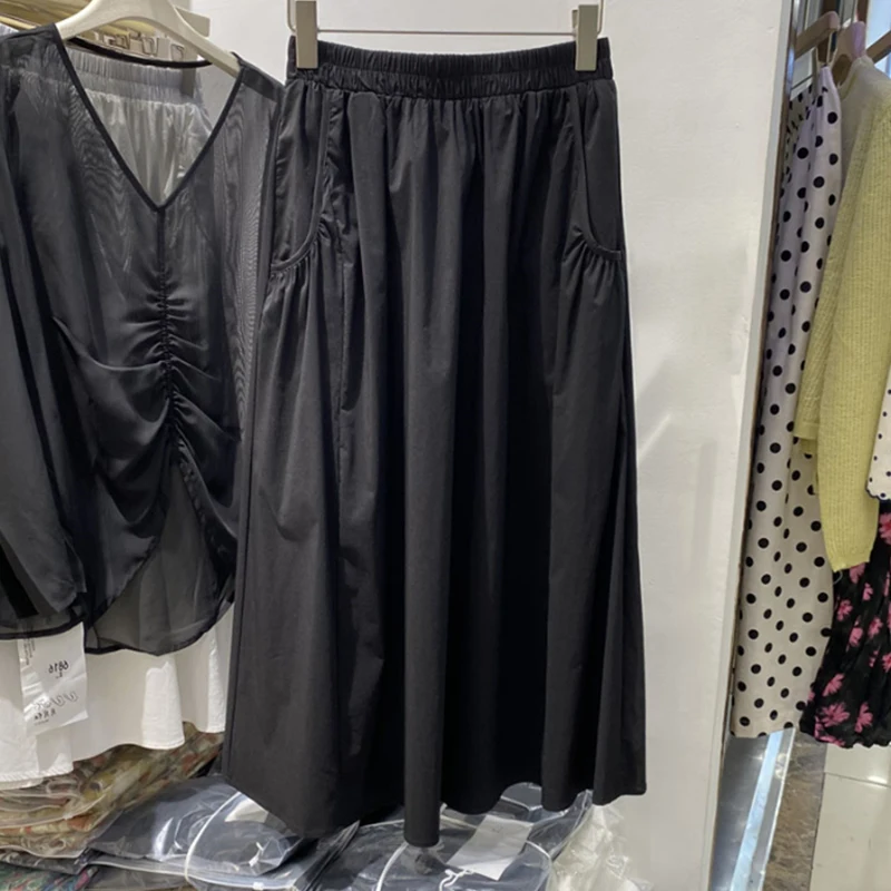 Neue koreanische Mode Mode lässig hohe Taille lose lange A-Linie Rock für Frauen