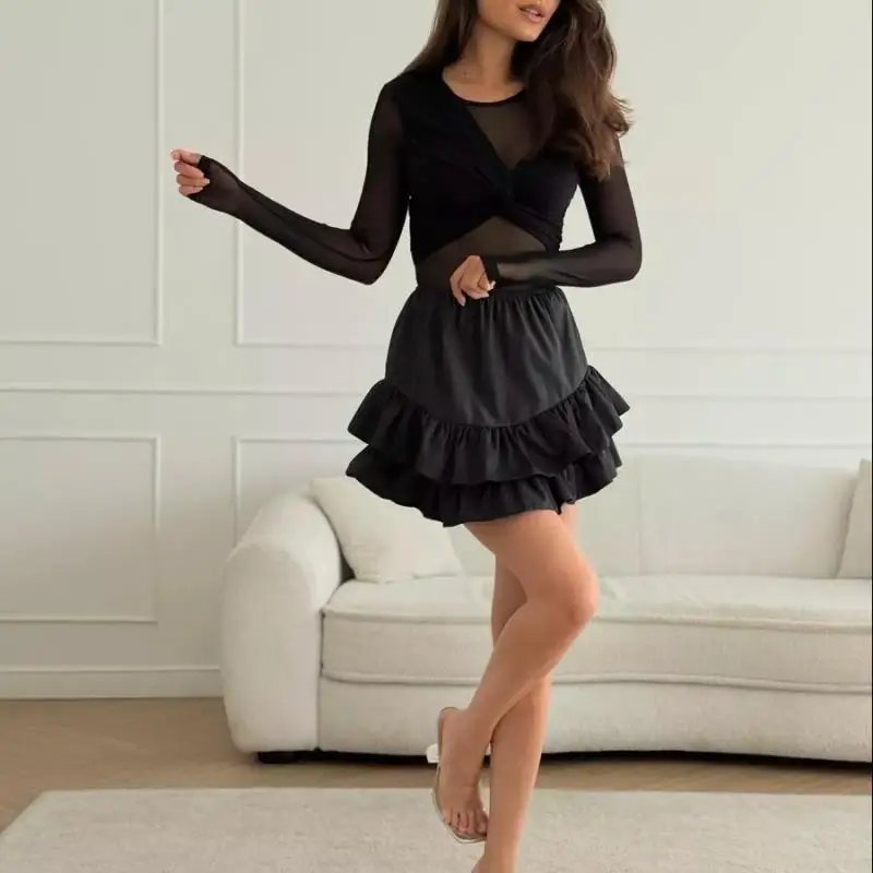 新しい春と夏のメッシュ生地パッチワークセクシーなホットガールスタイルシースルー長袖結び目スリムフィットジャンプスーツ、女性のトップ