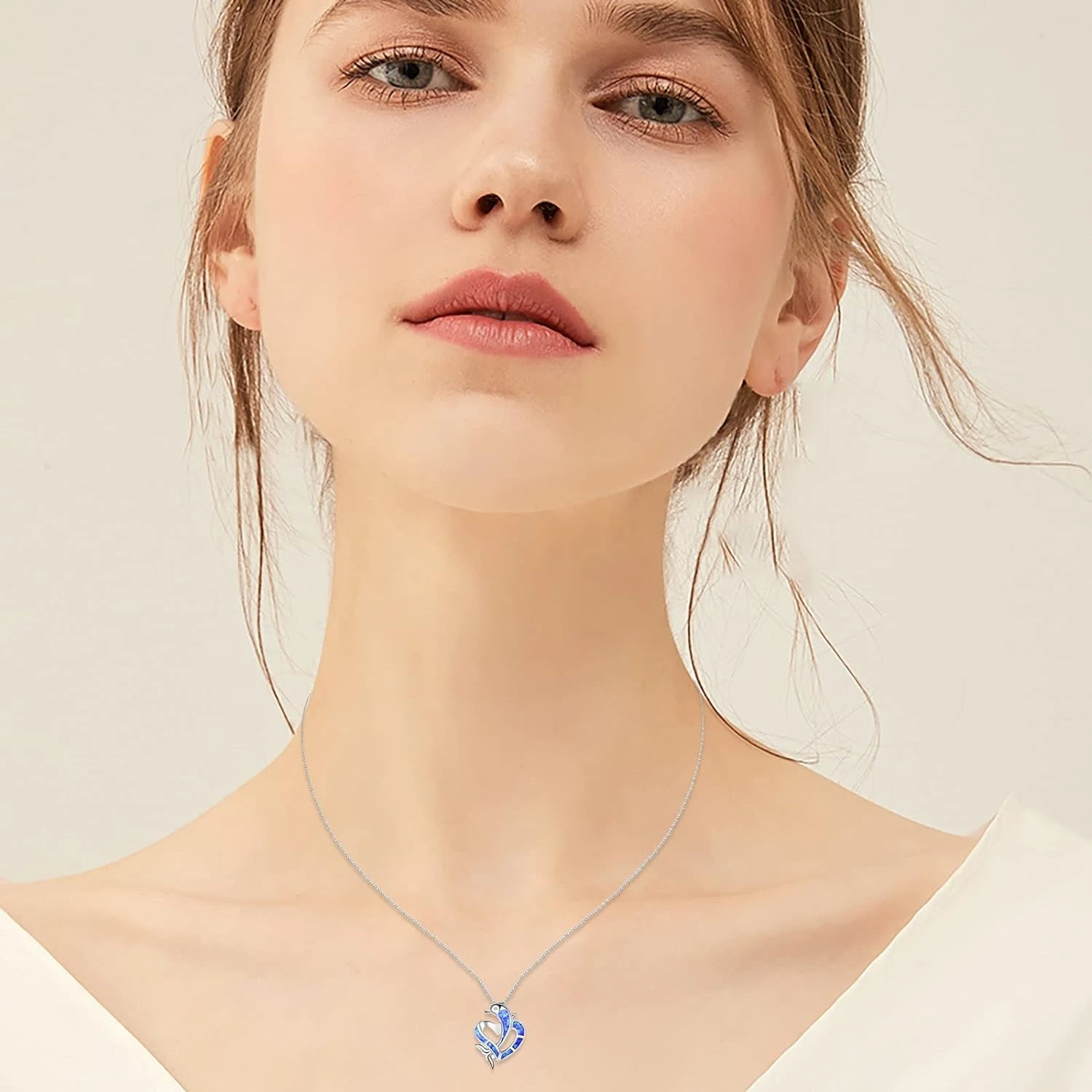 Elegant and stunning silver rectangular opal dolphin pendant necklace - a graceful and beautiful addition to any womans fashion