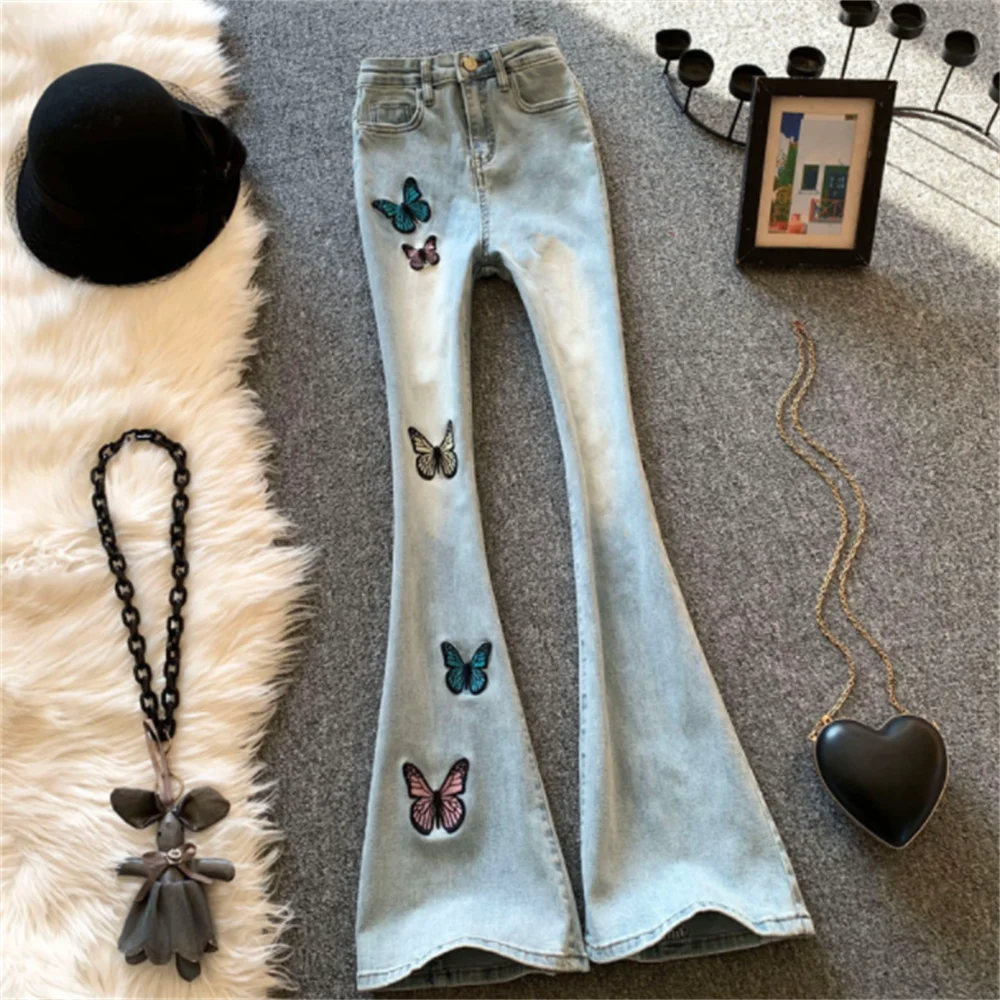 

Light color flare jeans women spring and autumn new high-waisted butterfly embroidery skinny peach buttocks horseshoe pants