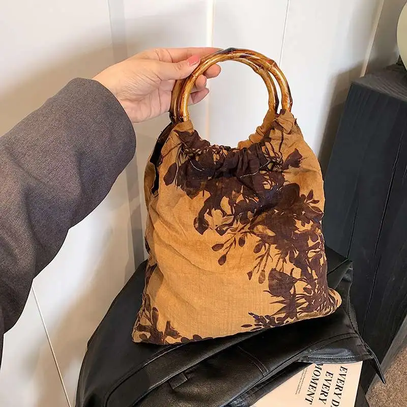 

New Chinese Style Bamboo Node Women's Handbag Spring 2024 Retro Print Bucket Bag Fashionable National Trend Handheld Cloth Bag