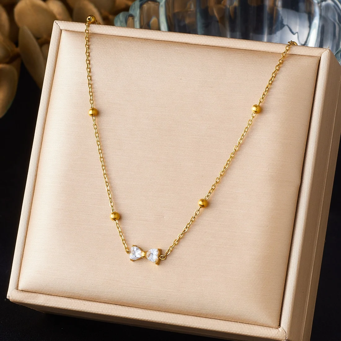 DIEYURO 316L Stainless Steel Simple Bowknot Inlay Zircon Golden Ball Necklace For Women Fashion Waterproof Neck Chain Jewelry view 6