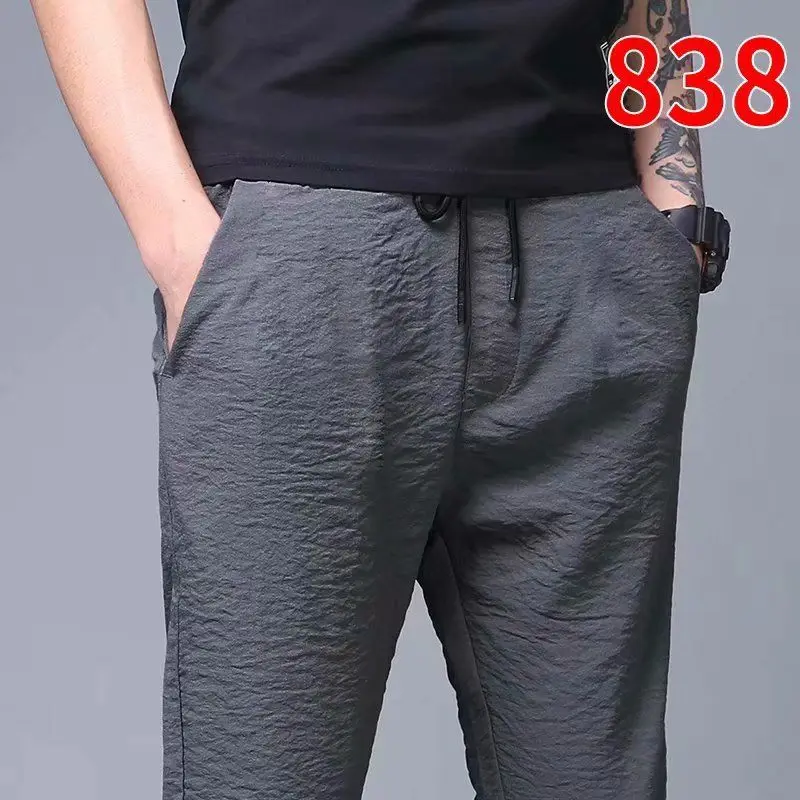 

Summer 2024 Men's Ice Silk Loose Fit Casual Pants Breathable Oversized Cuffed Trousers Faionable Versatile Long orts