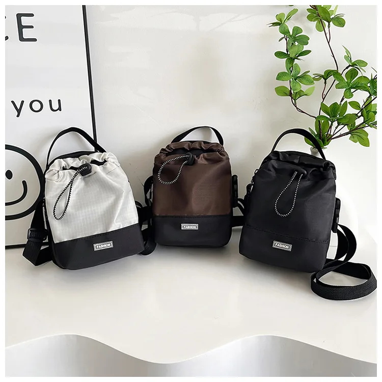 Neutral style small drawstring shoulder bag, fashionable, casual, waterproof, outdoor travel phone bag