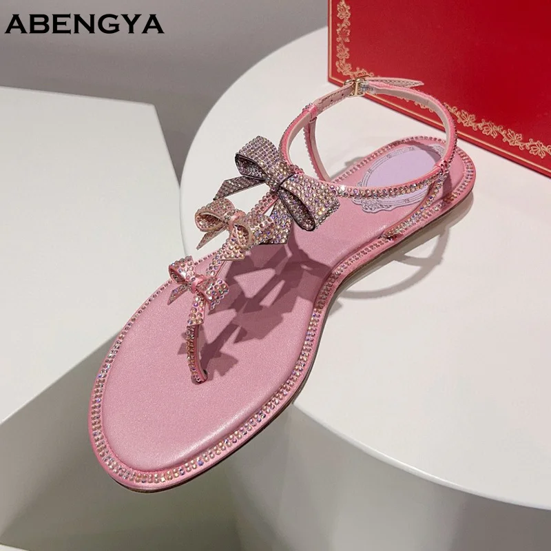 

Designer New Flip Flops Leather Crystal Sandals Women Split Toe Bow Knot Casual Flat Sandals Summer Sexy Party Dress Shoes Women