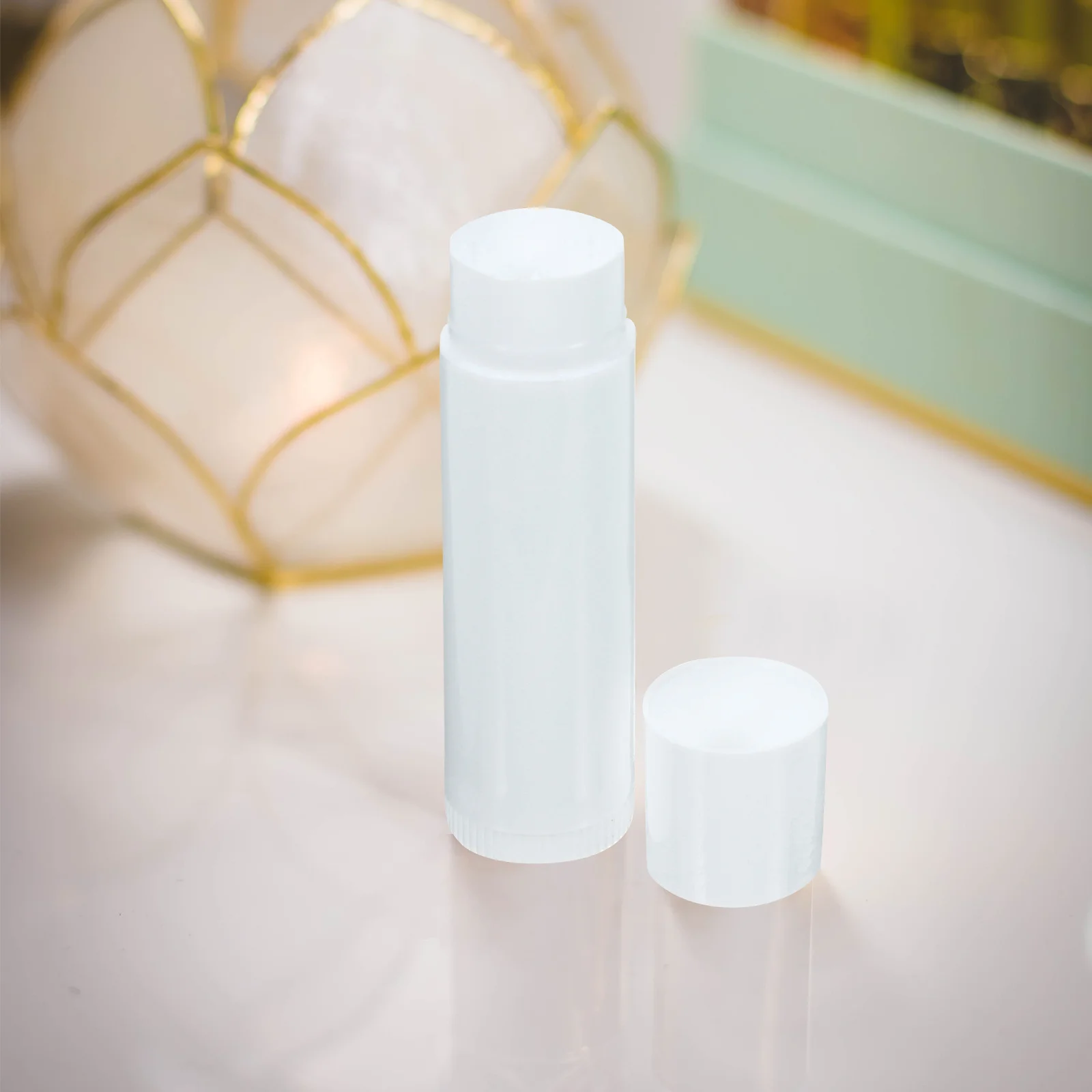 

50Pcs Empty Lip Balm Tubes PP Natural Transparent Container with White Caps for DIY Lip Gloss Moisturizer Stick Packaging