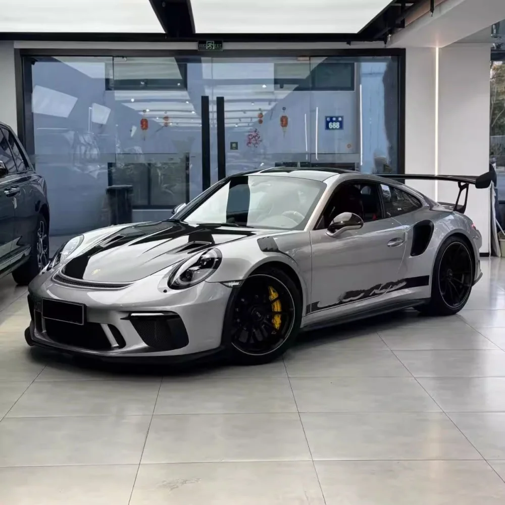 

Подходит для Porsche 911 979. Модернизирован с новой крышкой двигателя из сухого углеродного волокна, капотом двигателя и деталями кузова.