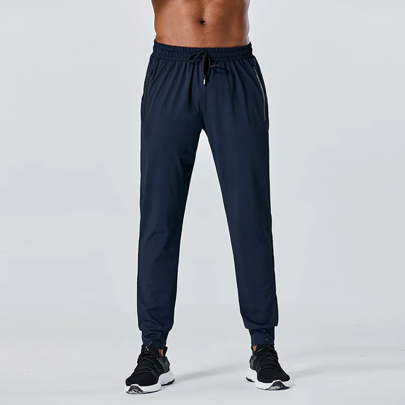 Yoga sports cuffed pants with brand logo men loose sweatpants elastic drawstring waist trousers zipper pockets niners slacks