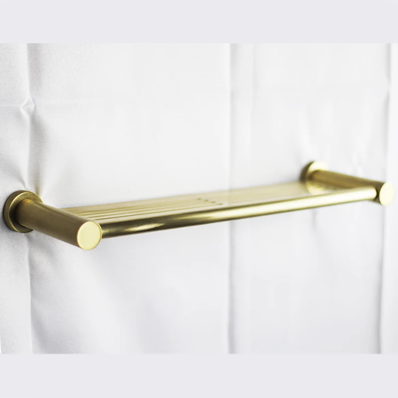 

Wall-mounted brass, floating bathroom storage rack, corner fittings