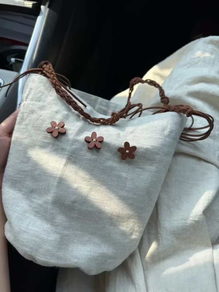 

Flower Decoration Handheld Shoulder Commuter Bags 2025 New Versatile Solid Color Canvas Bucket Bag for Women