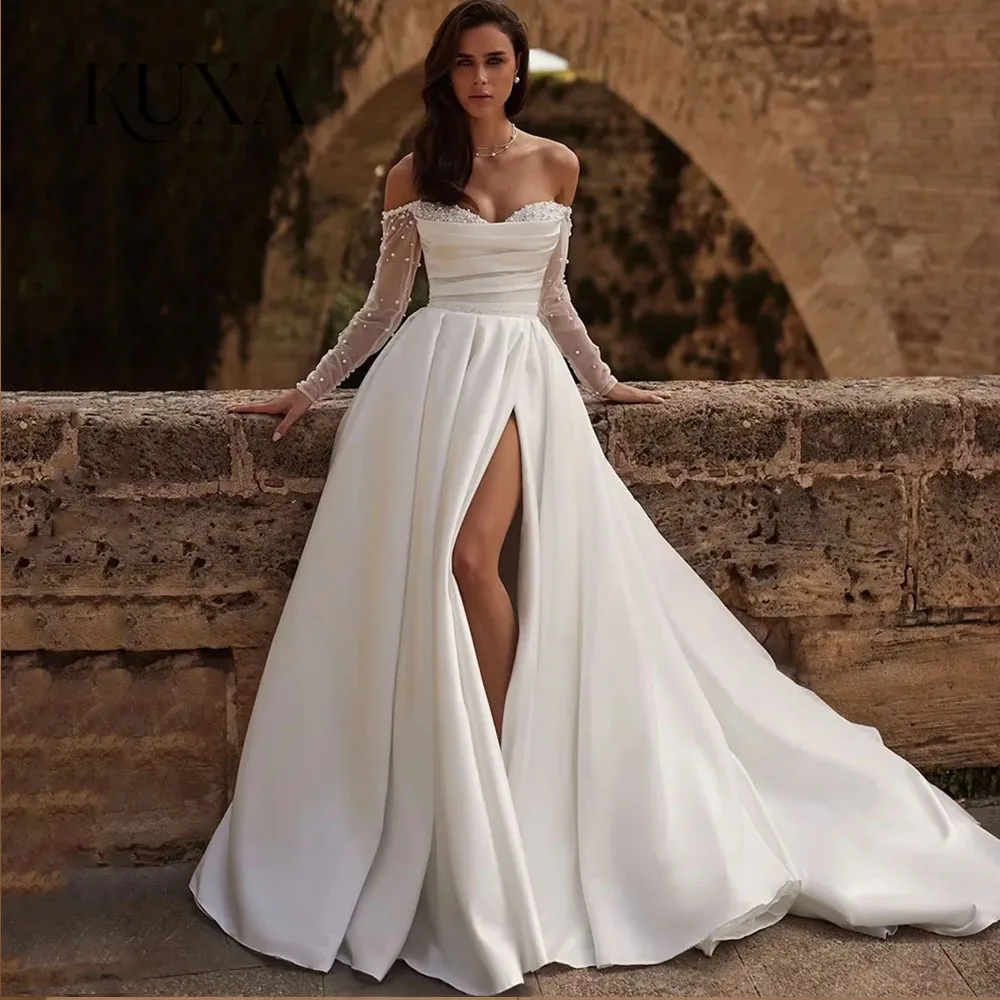 KUXA Elegant Wedding Dress Customized Sweetheart Full Sleeves Beading Pearls High Slit Sweep Train Woman Bride Bridal Gown 2026
