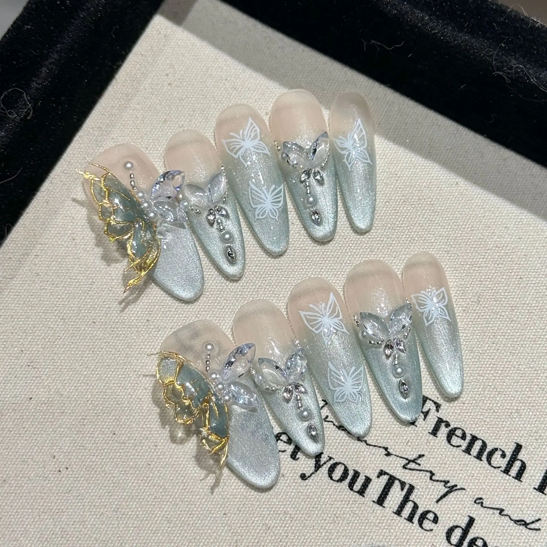 Faux ongles œil de chat à paillettes, longs dégradés d'amande, bleu, à pression, faits à la main, avec motifs papillon, manucure douce et portable