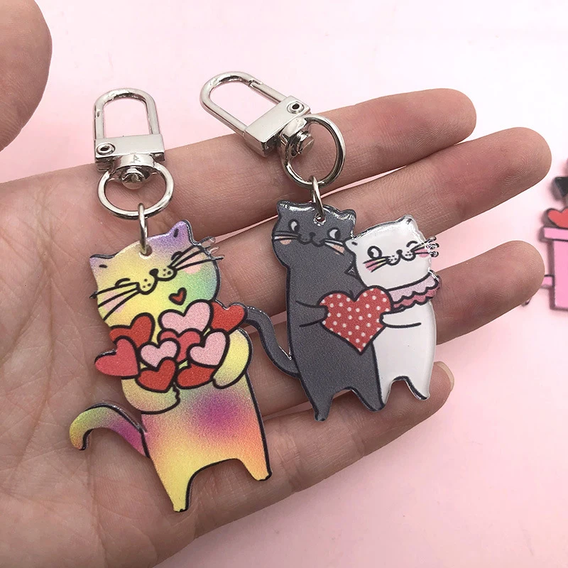 LLavero de gato de dibujos animados para pareja, colgante de acrílico con forma de gatito, mariposa, nudo, cachorro, bolso, auriculares, mochila, regalos