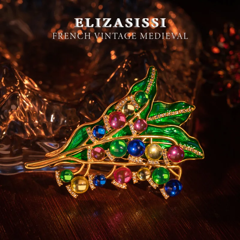 

Europe And The United States Medieval Vintage Electric Gold-plated Leaf Modeling Heavy Glass Inlaid Women's Fashion Sweet Brooch