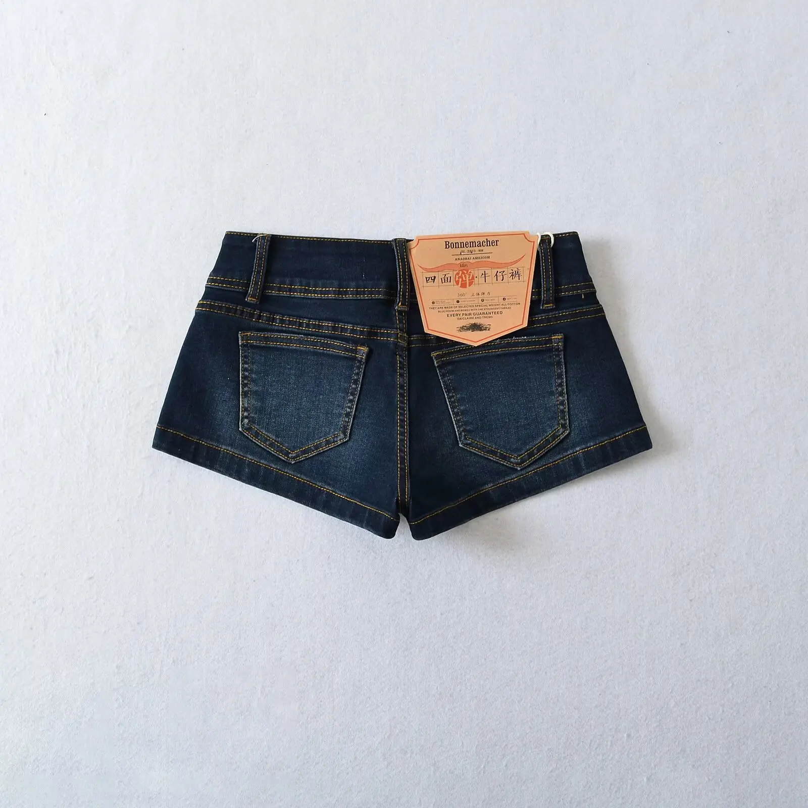 กางเกงยีนส์เอวต่ำทรงสุดฮิตสไตล์อเมริกันเรโทรสำหรับสาวฮอต ผ้ายืดหยุ่นกระชับทรงสวย เซ็กซี่ โชว์สะโพก ดีไซน์ทันสมัย เหมาะสำหรับฤดูร้อน มีกระดุมสองเม็ด