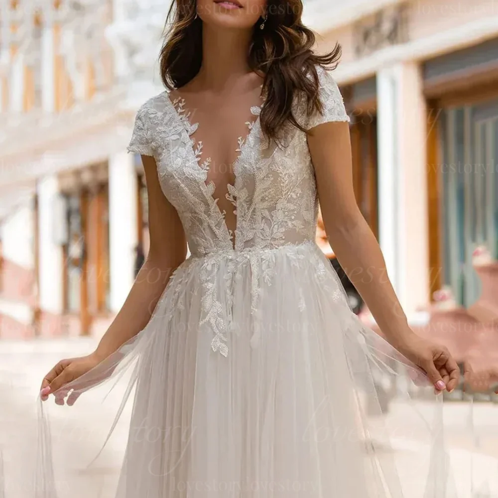 ชุดแต่งงานผ้าทูลล์ปักลายแบบสั่งทำพิเศษ ทรงเอ คอวี แขนสั้น สไตล์โบฮีเมียน เปิดหลัง ชุดเจ้าสาว vestido de novia