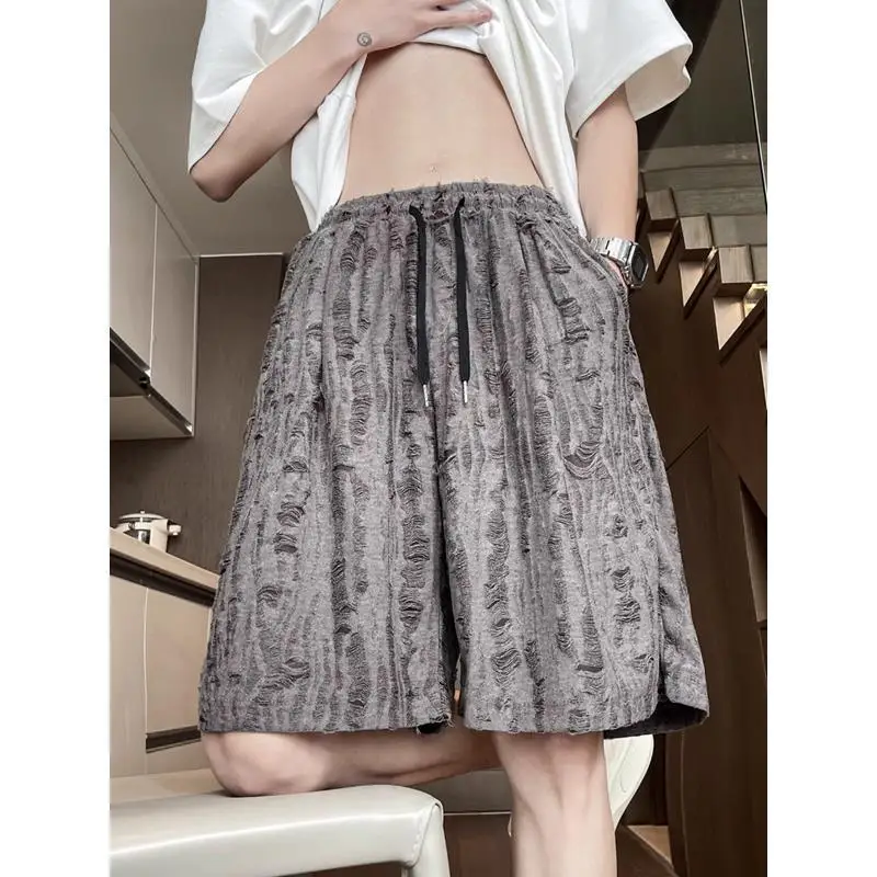 

Модные американские нишевые рваные шорты, мужские свободные повседневные брюки среднего размера с пятью точками