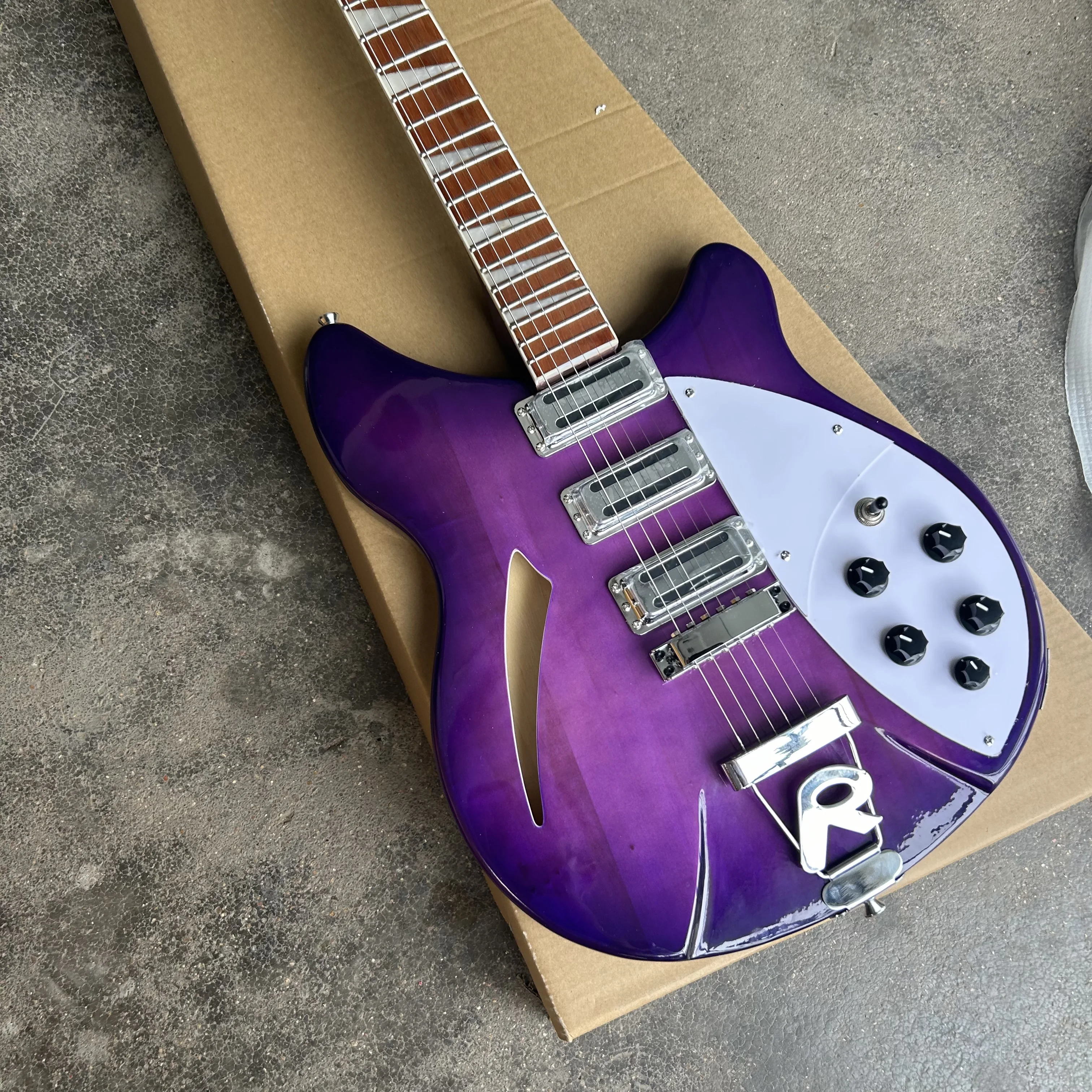 Nueva guitarra eléctrica morada 360, venta al por mayor y al por menor.