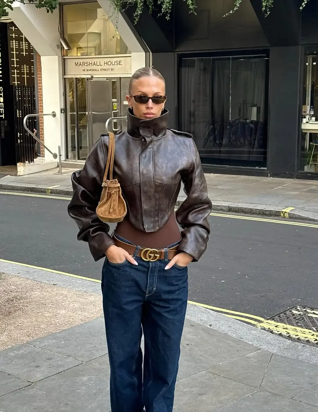 Giacca da donna in pelle con chiusura in vita Moda retrò Colletto alla coreana Manica intera Cerniera Fibbia Giacche corte 2026 Lady Street Outwear