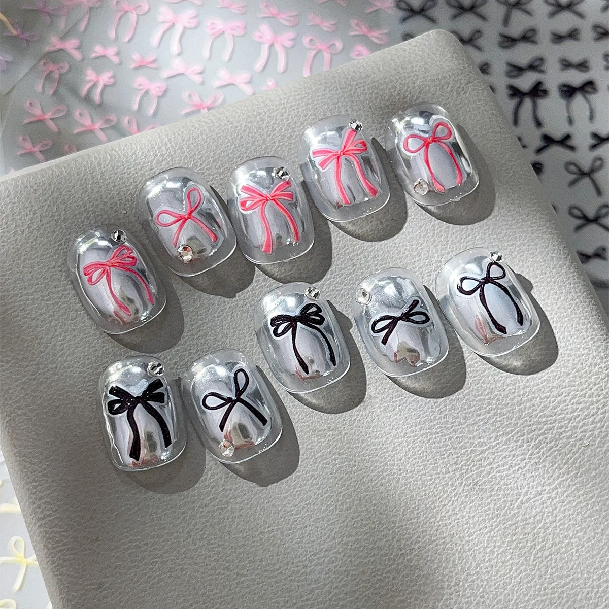 1 シート 3D 蝶ネクタイネイルステッカー - カラフルなシルクリボンデザイン、粘着裏地付きエレガントなネイルアートデカール