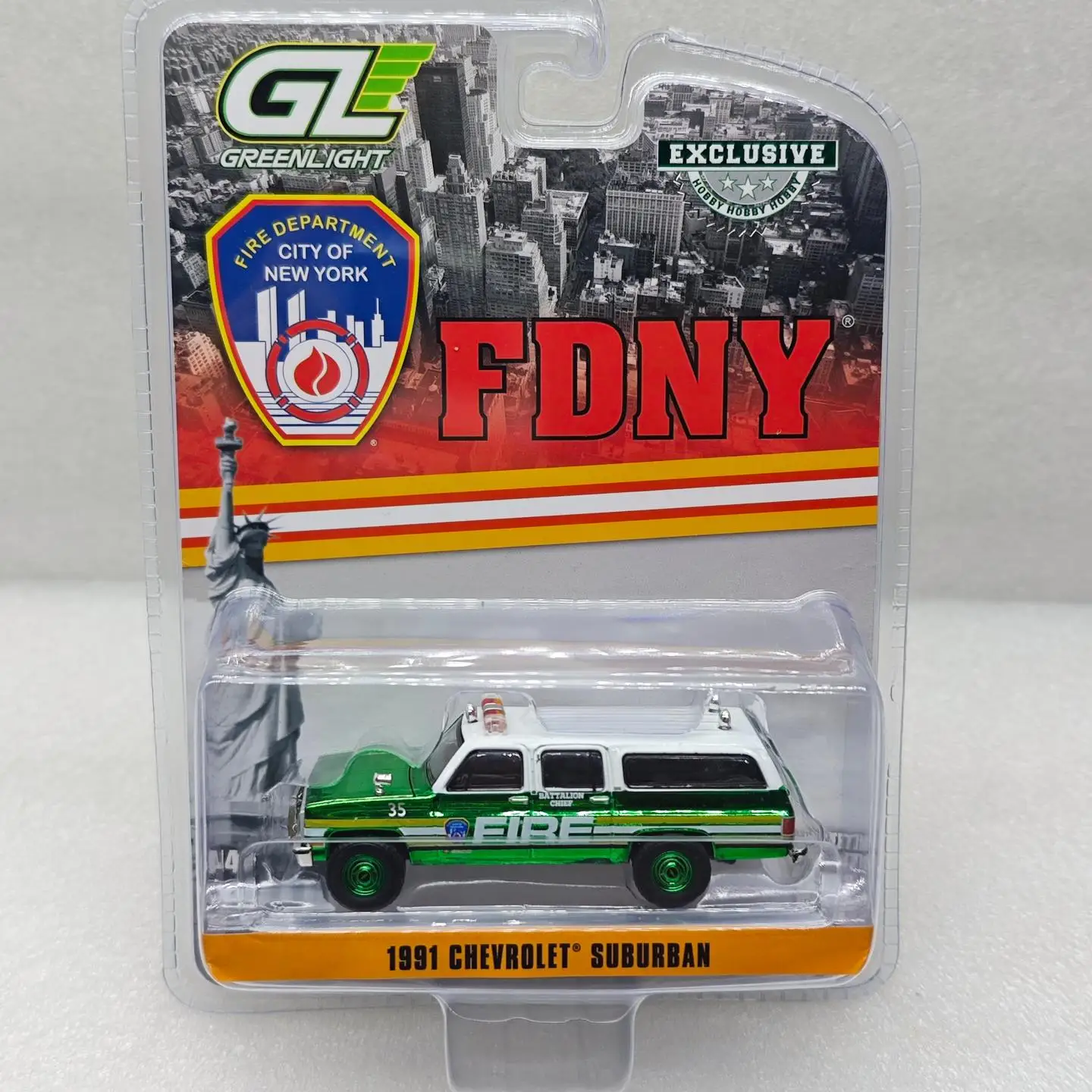 

GreenLight 1:64 1991 Chevrolet Suburban - FDNY Official Fire Department of New York City, Electroplated Green Alloy Car Model